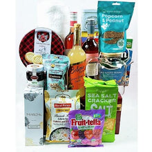 Assorted snacks and drinks including bottles, boxes, and bags on a white background