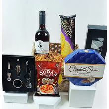 Baron Romero Wine, Chocolates, wine screw gifts set, Dodan Cashews , A box of socks, and Biscuits displayed. On a white background