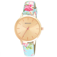 A rose gold-toned Henley analog watch with a floral patterned strap and a sunburst dial.