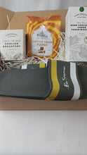 A mens gift box in brown, containing Mens Slides, Fudge , Luxury Bristish Tea and Luxury british Biscuits