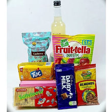 Assorted snacks and drinks including Fruitella, Tuc, Dairy Milk, and Almonds on a white background