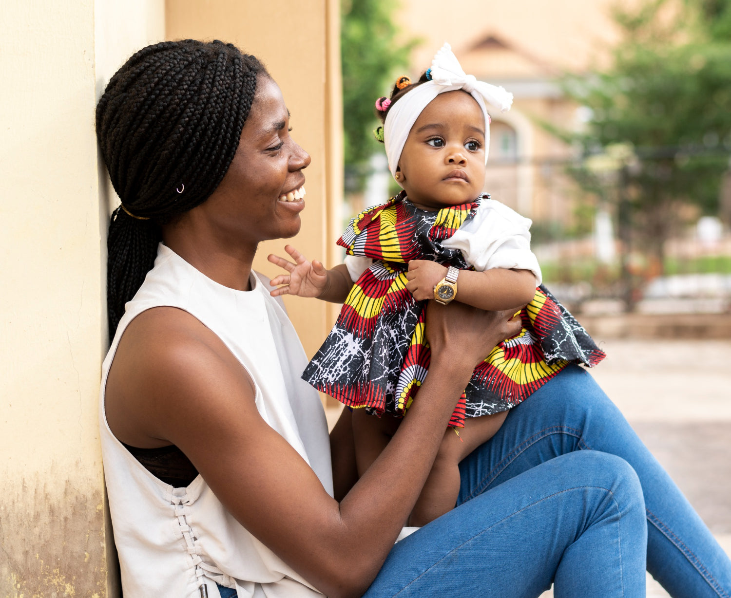 African Mother carrying her Baby girl