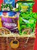 Basket of granola and snack mix packets on a red background