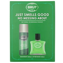 BRUT gift set containing a deodorant spray can and an after shave bottle, both in green and silver, presented on a green cardboard box with the slogan 'JUST SMELLS GOOD NO MESSING ABOUT'.