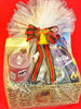 Elegant Christmas hamper with handwoven basket, tulle wrap, and festive bow