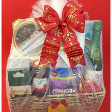 Elegant Christmas hamper with handwoven basket, tulle wrap, and festive bow