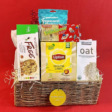 lose-up of classic indulgence gift basket showing treats and snacks arranged in it