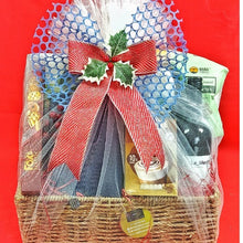 Gift Basket with festive wrap against a red background
