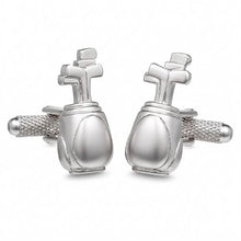 A pair of silver-toned metal cufflinks shaped like golf clubs in golf bags, shown on a clean white background.