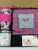 Gift set with pink floral cup, candle, and 'Girl Talk' notebook in a box.