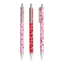 Three pens with different designs on a white background