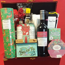 Luxury Christmas hamper filled with gourmet treats, wine, biscuits, and festive gifts.