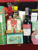 Luxury Christmas hamper filled with gourmet treats, wine, biscuits, and festive gifts.