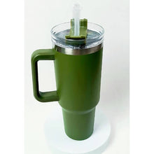 Green insulated mug with handle and straw on a white background