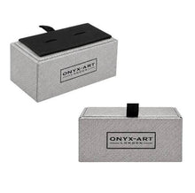 Two rectangular Onyx Art London textured gray boxes shown on a white background, one with a black lid and the other closed with a black handle visible.